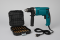 Udarna bušilica 710W + set od 99 HSS burgija u koferu